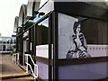 Image of George Eliot in window of Nuneaton Library