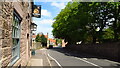 The Beehive PH & village street running north from Harthill