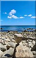 Rock balancing on St Loy beach