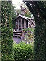 Summerhouse viewed through yew topiary, Hill Close Gardens, Warwick