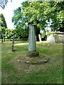 Medieval cross base in the churchyard