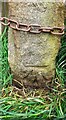 Benchmark on gatepost on NW side of Brown Bank Lane