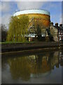 SX9291 : A now demolished gas holder across the Exeter ship Canal by Chris Allen