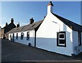 Cottages at the foot of Milne