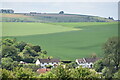 Downland above houses at Burcombe