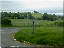 J2333 : The Ballynagappoge Road junction on the A25 by Eric Jones