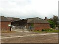 SK0918 : Old farmyard buildings, Woodhouse Farm by Alan Murray-Rust