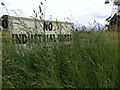 SP3485 : Overgrown NIMBY sign, Bedworth by A J Paxton