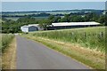 Road, barns and farmland, Candovers