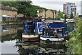 Moored narrowboats on the River Lee Navigation