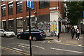 View of street art on the side of Allure Hair and Beauty on Pundersons Gardens from Bethnal Green Road