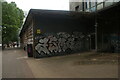 View of street art on the side of an electricity substation on Cambridge Heath Road