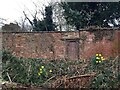 Old door in a garden wall by St Nicholas Park, Warwick