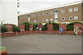 View of street art on the pillars of a brick wall around the edge of a car park off Graham Street #2