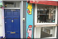 View of street art on the side of Coffee Studio on Shoreditch High Street