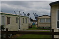 TM2932 : Caravan park and cranes, Manor Terrace, Felixstowe by Christopher Hilton