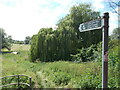 TL3370 : Ouse Valley Way sign at Holywell by Peter S