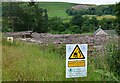 Warning sign and clear-felled plantation, Park Bridge