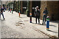 View of brightly painted bollards on Floral Street #6