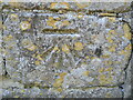 Benchmark on the Methodist church wall