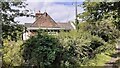 Cottage by level crossing in Low Crindledike