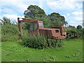 Old excavating machine at a farm near Prestwood