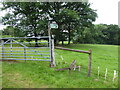 Footpath sign at the field boundary