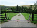 Cattle grid and driveway to Cwm-cilan