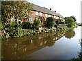 Houses reflected in the Oxford Canal