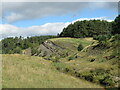 Rock strata on the edge of former opencast coal mine, Poniel