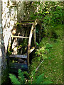 NY1801 : Disused waterwheel, Whillan Beck sawmill by Mick Garratt