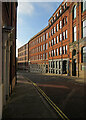 Sunlit warehouses on Stanford Street