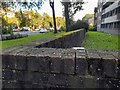 Wall around flats on Clapton Common