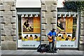 Buxton: Busking near to the entrance to the Spring Gardens Shopping Centre