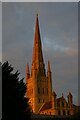 TG2308 : Norwich cathedral spire, sunset light by Christopher Hilton