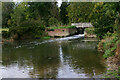 Footbridge across weir at Clare Mill Gates