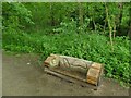 Carved log bench in The Roughs