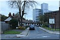 View of a curved terrace of cottages on Canham Street from Portman Road