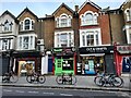 TQ3285 : Shops on Green Lanes, Stoke Newington by David Howard