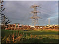 Grid pylons and a substation near Newhouse