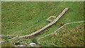 NY7567 : Hadrian's Wall and turret at Peel by Sandy Gerrard