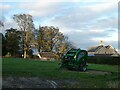 NY9462 : Field and farm machinery at Beacon Hill Farm by Oliver Dixon