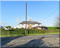 TL6548 : Withersfield: junction, signpost and stinkpipe by John Sutton