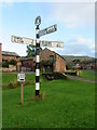 NY6039 : Signpost in Gamblesby by Gordon Hatton
