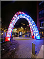 SJ8498 : Illuminated Arch at Piccadilly Gardens by David Dixon