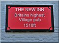 Sign on "The New Inn" in Flash