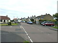 NU2329 : Longstone Crescent at the junction with Meadow Lane by Richard Law