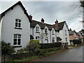 Model Cottages dated 1883 in Astley