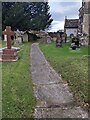 ST4391 : Churchyard path, Llanvaches by Jaggery