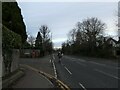 Cyclists passing Berkeley Court on the A3100